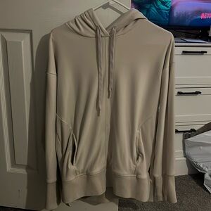 Women’s oversized sweatshirt size medium cream colored the most heavily fabric.